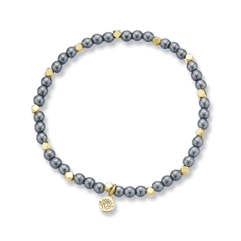 HEMATITE AURA OF GOLD GEM BRACELET