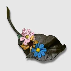 pink, yellow, and blue daisies   leaf brooch